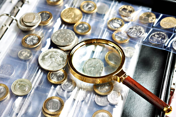 Coin collecting with magnifying glass